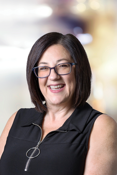 Portrait of Christine Pullara, Client Care Coordinator.